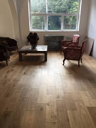 pose parquet massif sur carrelage